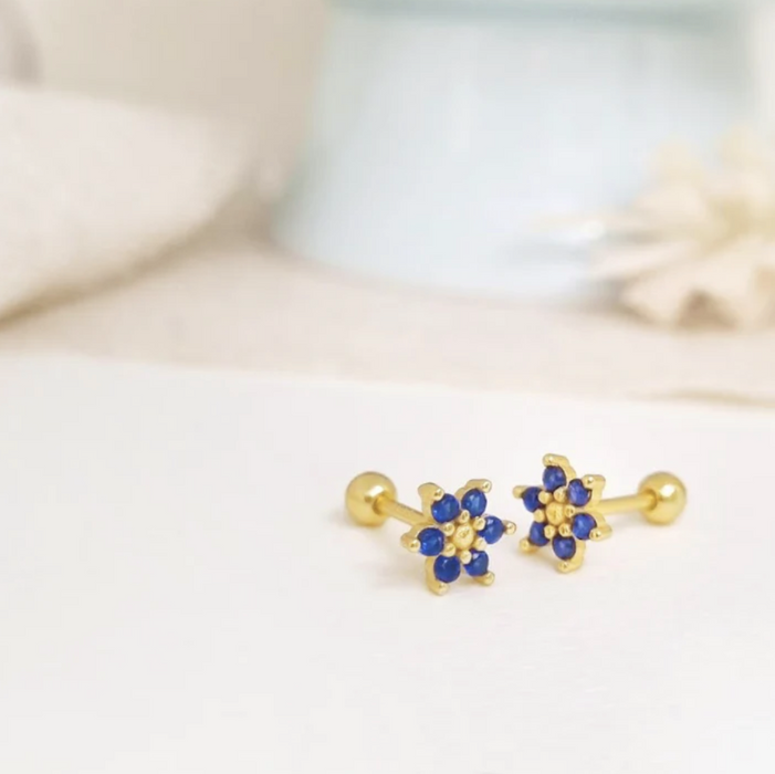 aretes mini flor circonia azul – plata 925