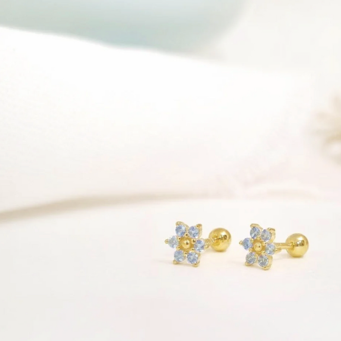 aretes mini flor circonia aguamarina – plata 925