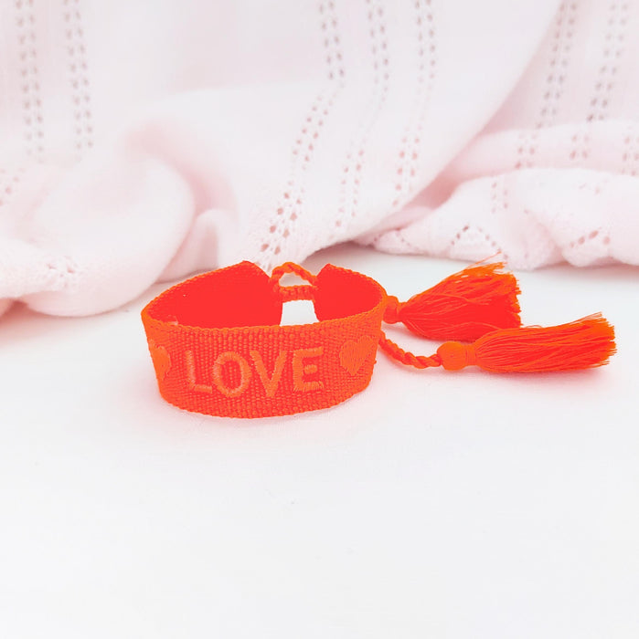 LOVE bright orange word bracelet