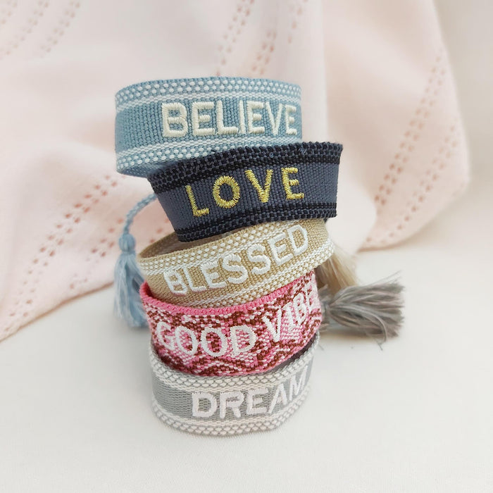 PEACE beige word bracelet