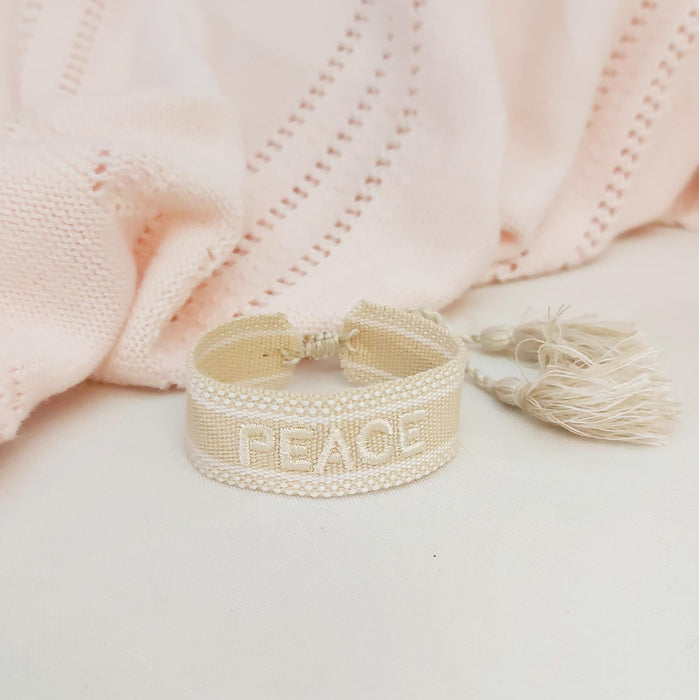 PEACE beige word bracelet