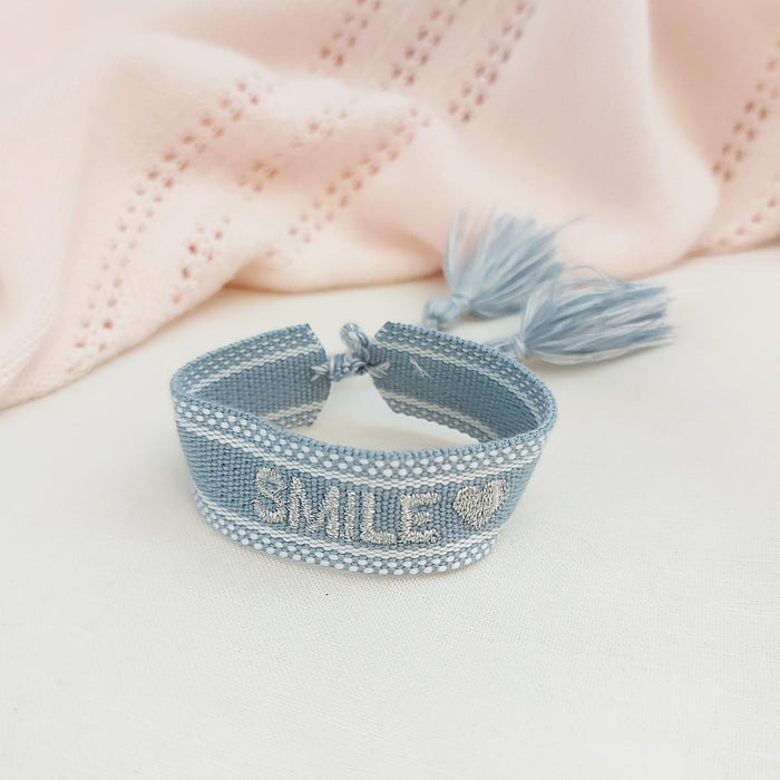 SMILE light blue word bracelet