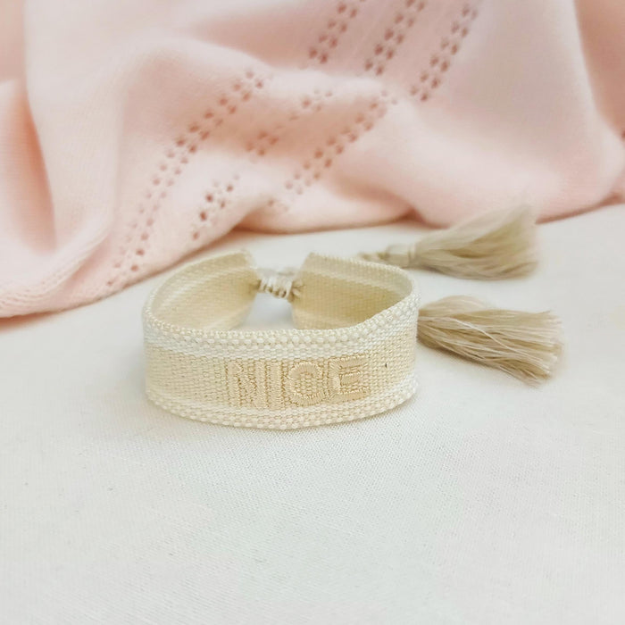 NICE beige word bracelet