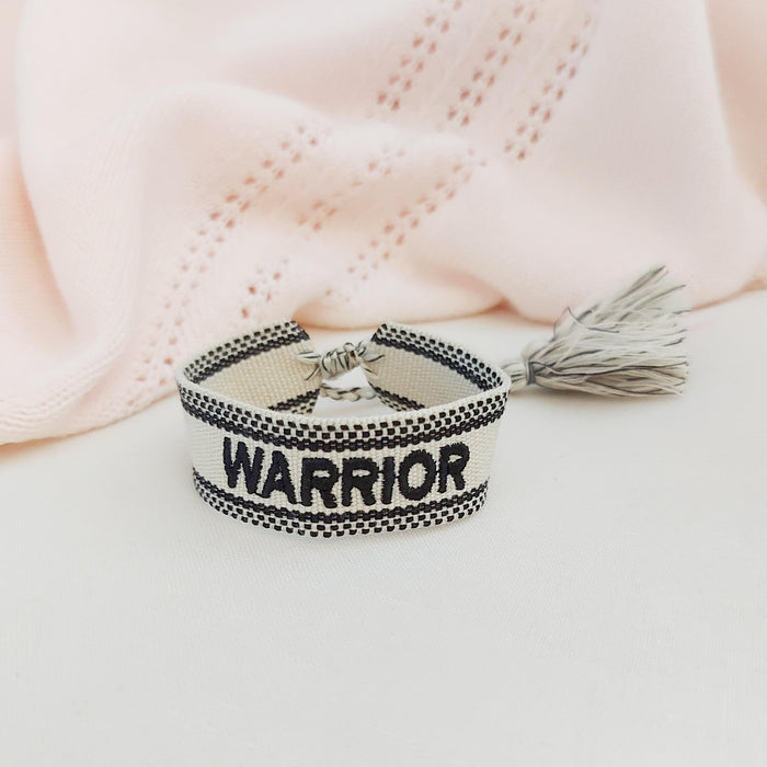 WARRIOR beige/black word bracelet