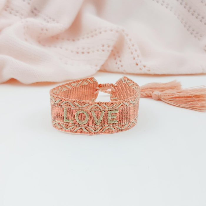 LOVE peach/gold word bracelet