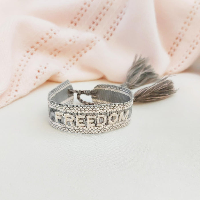 FREEDOM grey/pink word bracelet