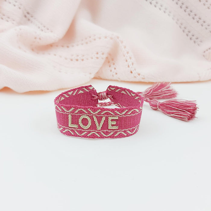 LOVE dark pink/gold word bracelet